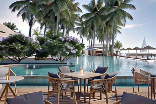 The luxurious resort's outdoor setting features bespoke furniture around a tranquil pool, complemented by lush palm trees and a serene ambiance