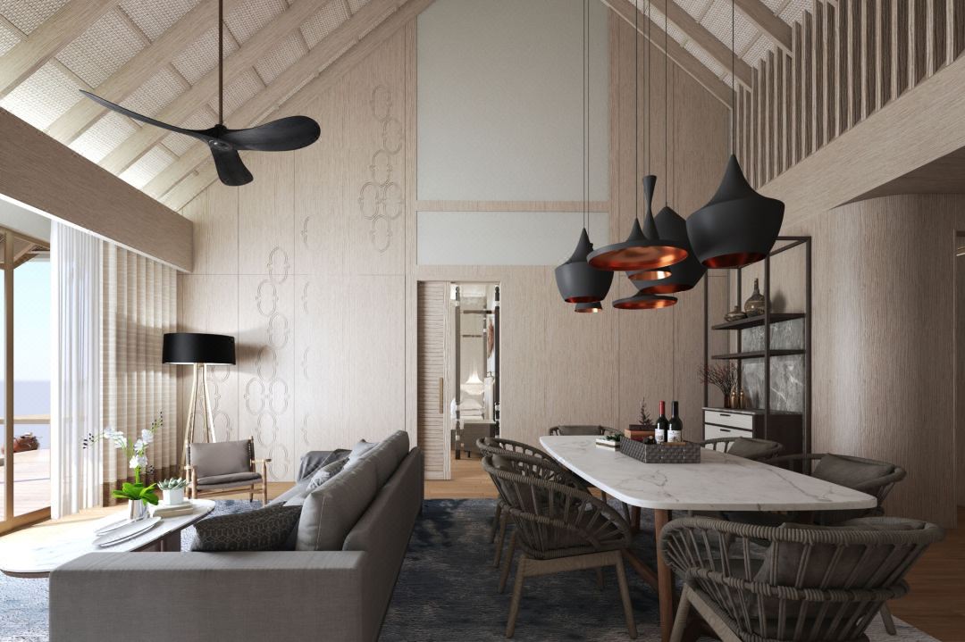 luxurious resort room with a high ceiling, elegant dining area, and a comfortable lounge that opens to a scenic view.