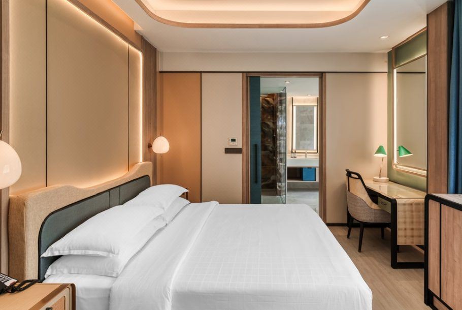 Renovated guest room with custom loose furniture at Dusit Thani Krabi Beach Resort